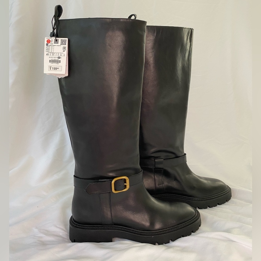ZARA 
FLAT KNEE HIGH LEATHER BOOTS WITH BUCKLE